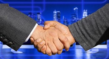 BUSINESS DEAL HANDSHAKE 1