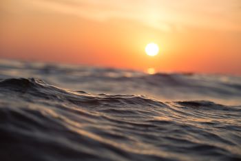 SEA WAVES SUN
