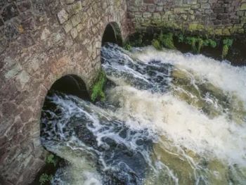 Sewage discarge into river generic